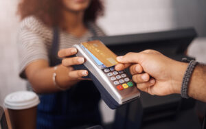 Credit card machine, cafe and hands of customer for b2c shopping